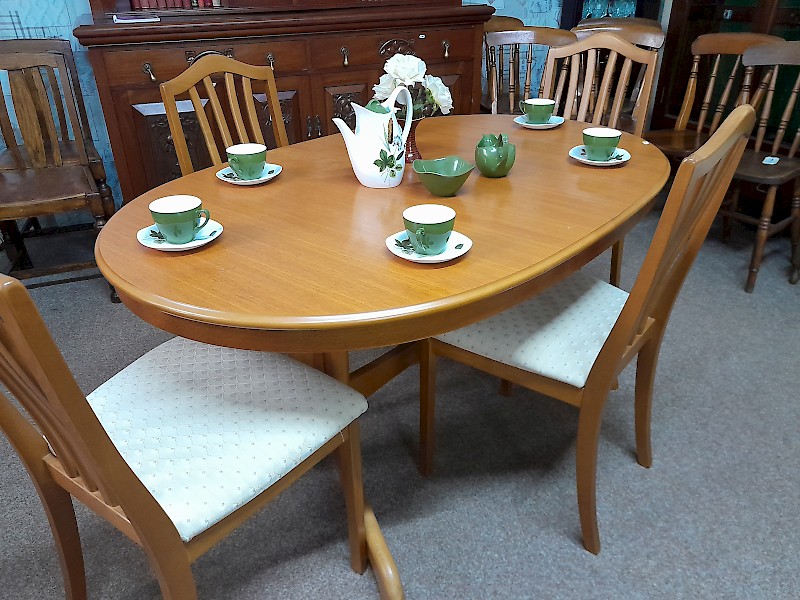 Extending table and four chairs