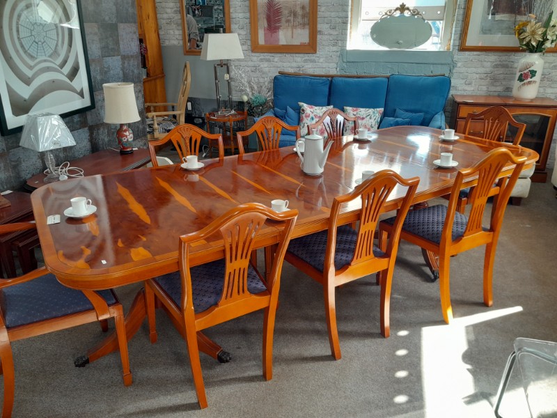 Yew extending table and eight chairs