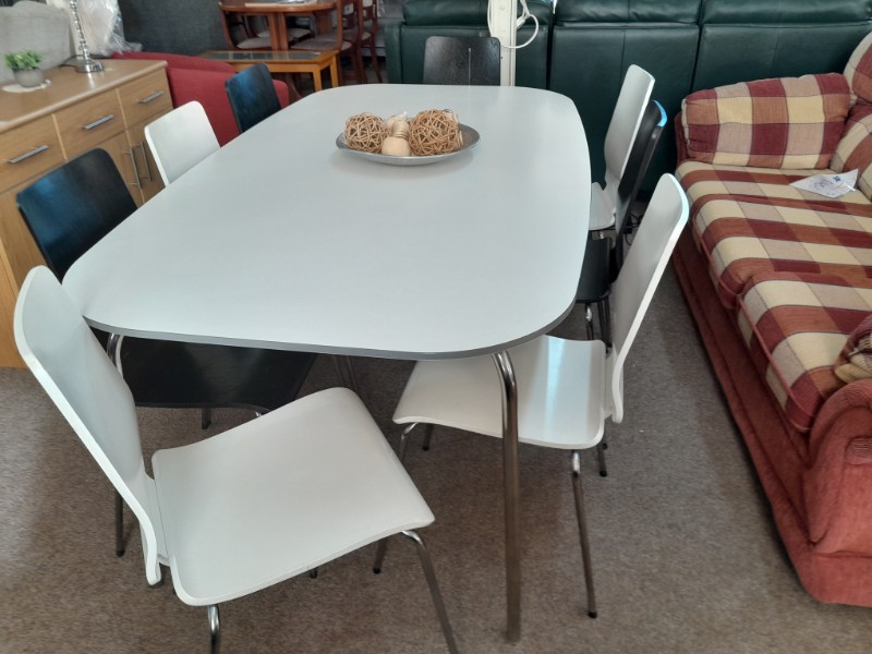 White table and eight chairs